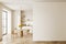 White kitchen interior with cabinets, table and blank wall