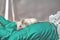 White laboratory mouse in the hands of a laboratory technician. Against animal testing