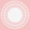 White lacy napkin on a pink background. Openwork round lace frame