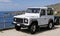 White Land Rover Defender on holiday