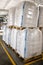 White large containers for bulk material on pallets