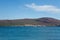 White large yacht stands at the pier in the town of Tivat