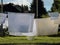 White Laundry Linen Drying in the Sun Backlight