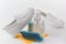 White leather slip-on shoes and set of brush, cloth and spray detergents