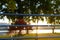 White light bulbs decoration a metal fence on a sunset landscape