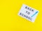 White lightbox with back to school text on yellow background with blue pen