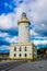 white lighthouse (Farola) in Malaga port ...IMAGE