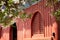 White Lilacs in spring, traditional Chinese architectural style red walls