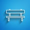White line Bench icon isolated on blue background. Long shadow