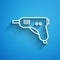 White line Electric hot glue gun icon isolated on blue background. Hot pistol glue. Hot repair work appliance silicone