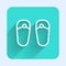 White line Flip flops icon isolated with long shadow. Beach slippers sign. Green square button. Vector