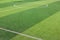 The white Line marking on the artificial green grass soccer field