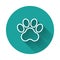 White line Paw print icon isolated with long shadow background. Dog or cat paw print. Animal track. Green circle button