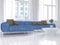 White living room interior with blue couch