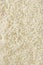 White long rice background, uncooked raw cereals texture, detailed vertical textured macro closeup