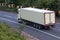 White lorry travelling on motorway