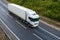 White lorry travelling on motorway