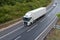 White lorry travelling on motorway