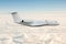 White luxury executive aircraft flies in the air above the clouds