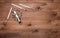 White make-up brushes on brown wooden table