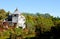 The White mansion on blue sky in Sharovka