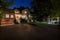 White mansion with cobbled driveway