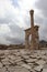 White marble arch gates among the ruins of ancient city Sagalassos in Turkey mountains