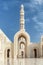 White marble arches and minaret, the Sultan Qaboos Grand Mosque