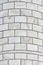 White marble bricks of Taj Mahal minaret towers, close up ivory white marble bricks background