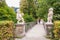 White marble dwarfs at the entrance to the Dwarf Garden Zwerglgarten, Mirabell gardens, Salzburg, Austria