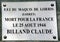 White marble memorial plaque for French resistant killed by Germans