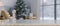 White marble tabletop over blurred background of living room on Christmas holiday