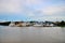 White marine ships & vessels moored at dock on Sarawak River Kuching Malaysia