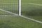 White marking strip on a soccer field with