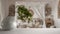 White mat table shelf with round marble vase and potted bonsai, green leaves, over bohemian bedroom with canopy bed, boho chic