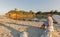 White middle age woman enjoys sunset on Corsiaca island beach