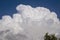 White milky clouds on blue sky