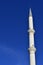 White minaret with clear sky against
