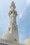 White minaret of mosque against the sky in Abu Dhabi, UAE