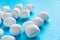 White mint sweets on blue background