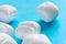 White mint sweets on blue background