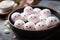 White Mochi Ice Cream with a kawaii cute face. Mochi Japanese dessert on a plate