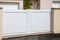 white modern plastic home gate portal polyvinyl chloride with panel blades pvc square in city suburbs house street