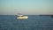 white motor yacht at sea at sunset, sea resort