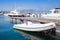 White motorboat floats moored in marina, Ajaccio