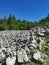 White Mountain with many pyramids of marble on the slope, built by people when making wishes, in the mountain park Ruskeala