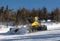 WHITE MOUNTAIN, RUSSIA - MARCH 10, 2016: Photo of Snowcat on the track of ski resort White Mountain.