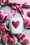 White mug with heart and pink tulips with shopping bag , top view. Spring holidays