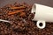 White mug and scattering coffee beans