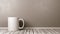 White Mug on Wooden Floor Against Wall